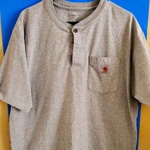 Get rugged comfort with Carhartt's large grey pocket tee - the perfect workwear